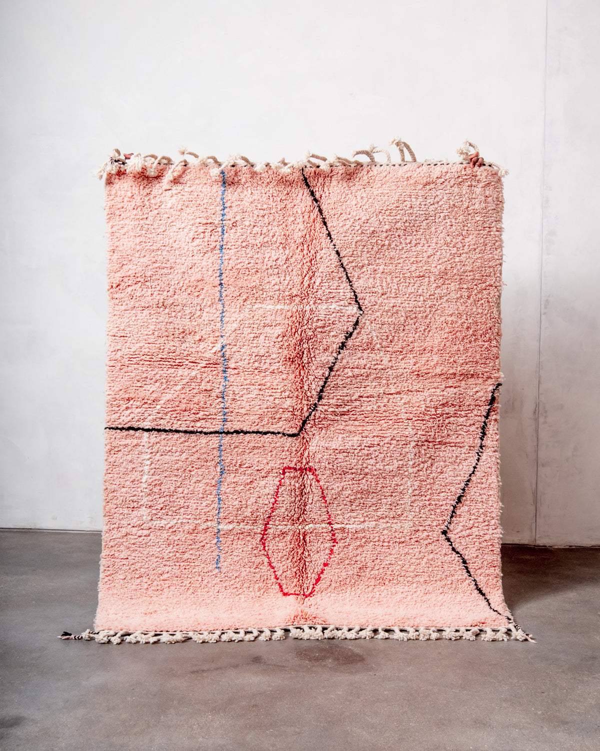 Modern, designer, handcrafted Berber rug from Morocco. Beniourain carpet with beautiful colours and patterns and fluffy wool texture.